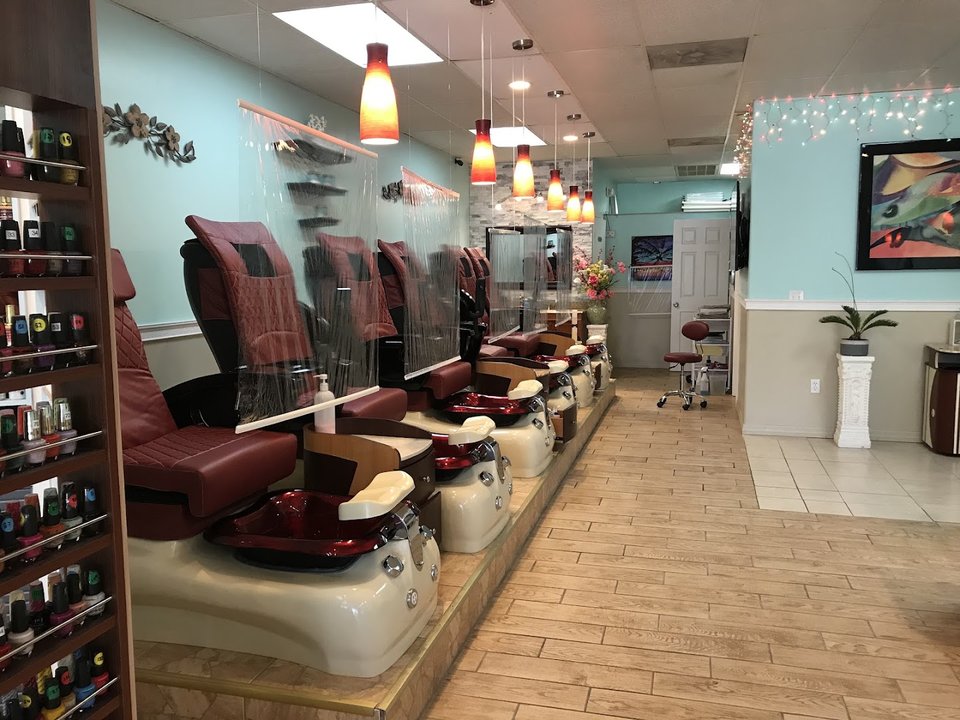 Manicure station with polish bottles and tools.